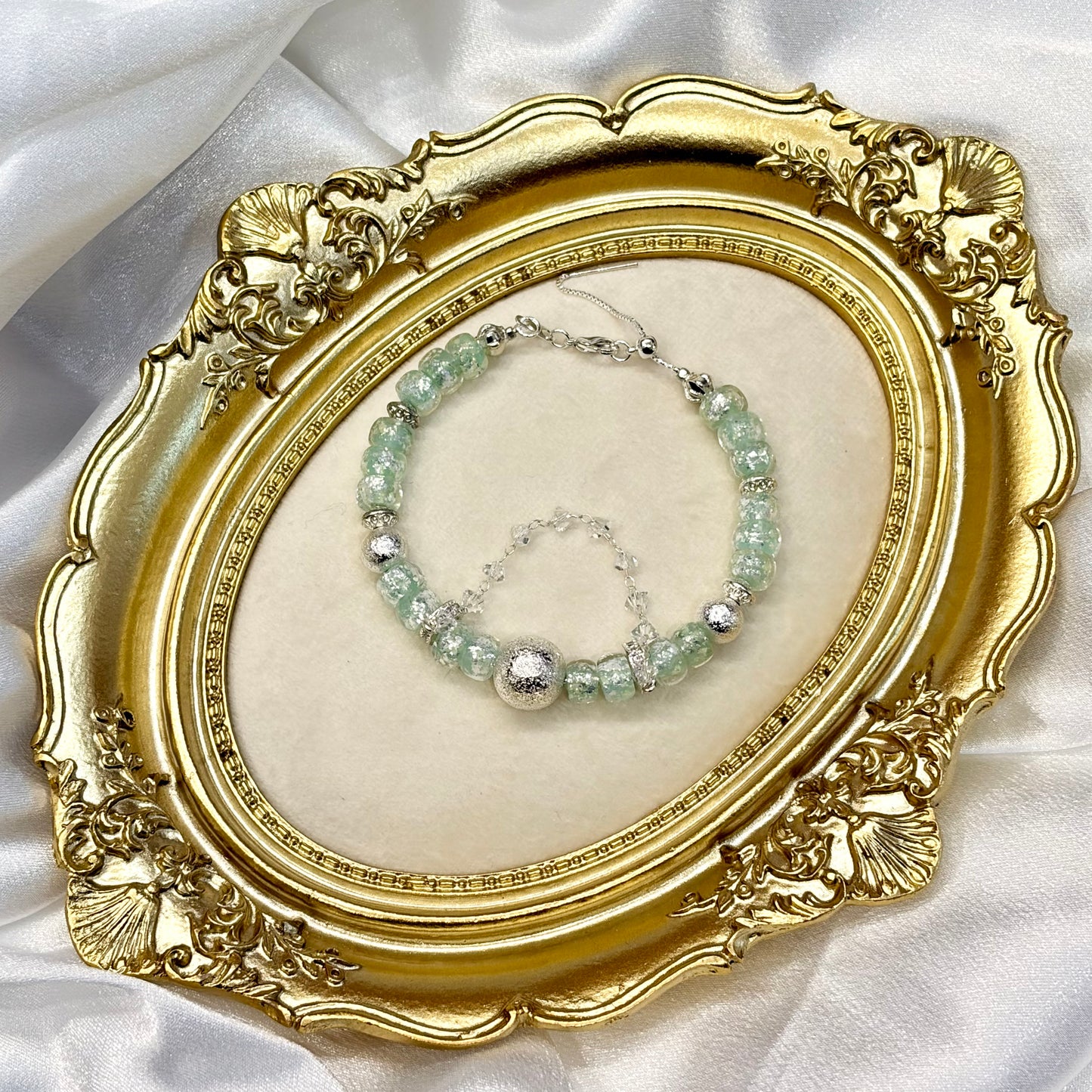 Handmade mint green crackle glass bead bracelet with silver crystal charms — coastal coquette jewellery gift for her