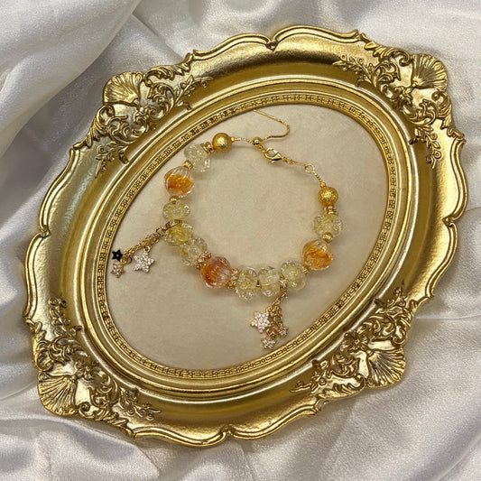 Handmade amber glass bead bracelet with CZ star charms — celestial fairy jewellery gift for her