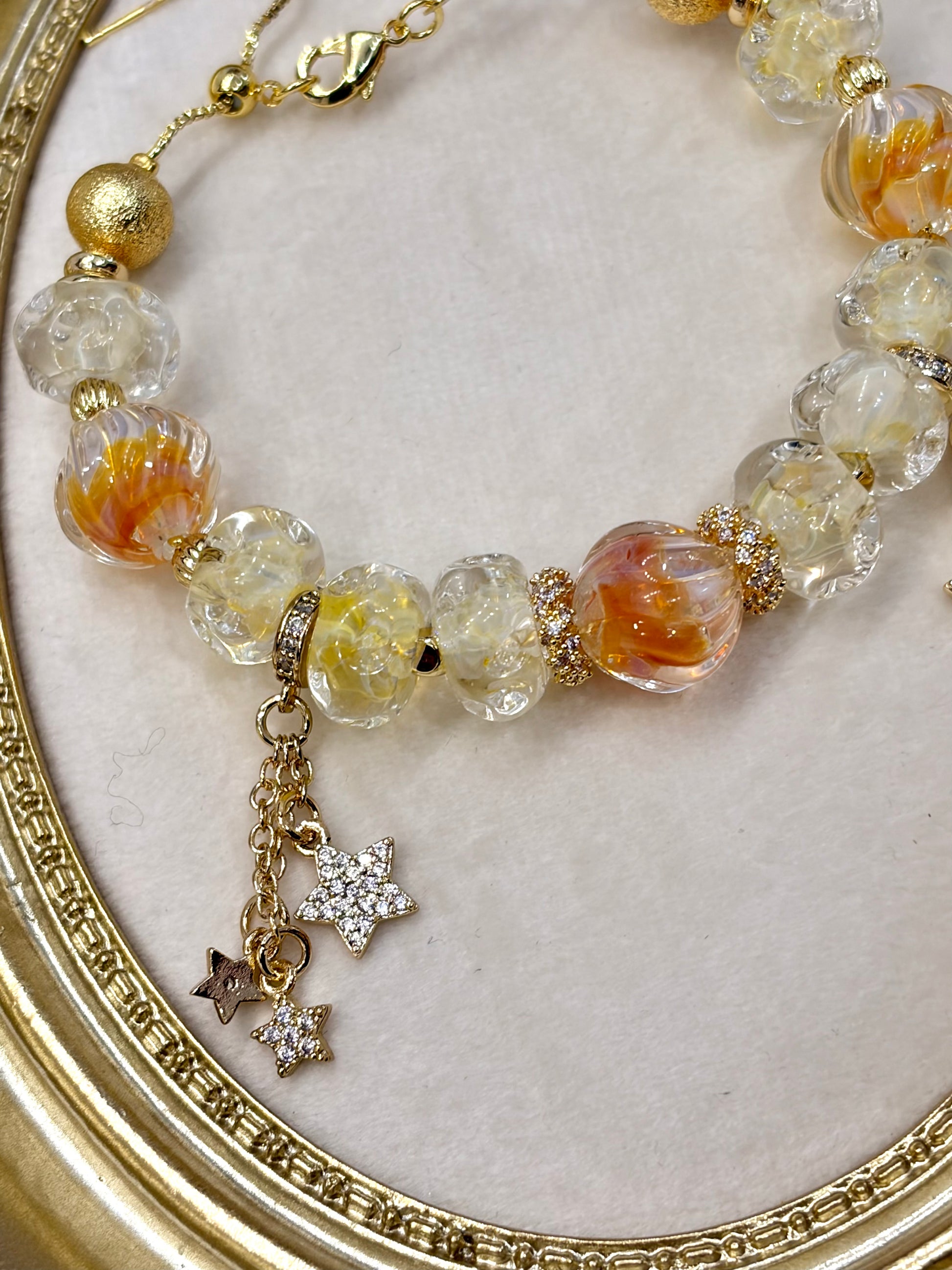 Necklace with star charms on a decorative circular background